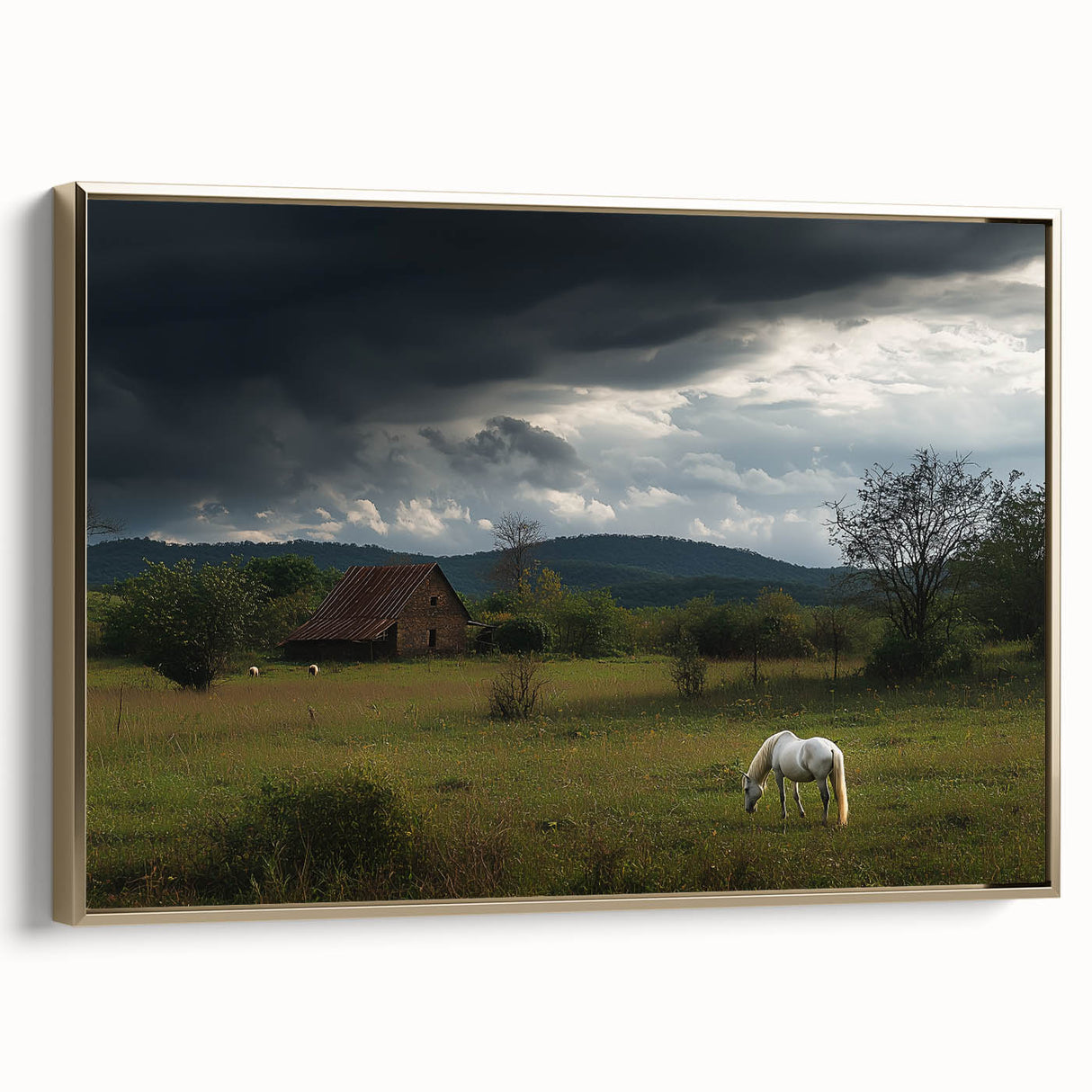 Framed canvas artwork depicting a serene countryside landscape with lush green fields and a vibrant blue sky. The gold frame enhances its elegant presentation, perfect for home decor.