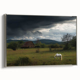 Framed canvas artwork depicting a serene countryside landscape with lush greenery and rolling hills, elegantly bordered in silver, perfect for home decor.