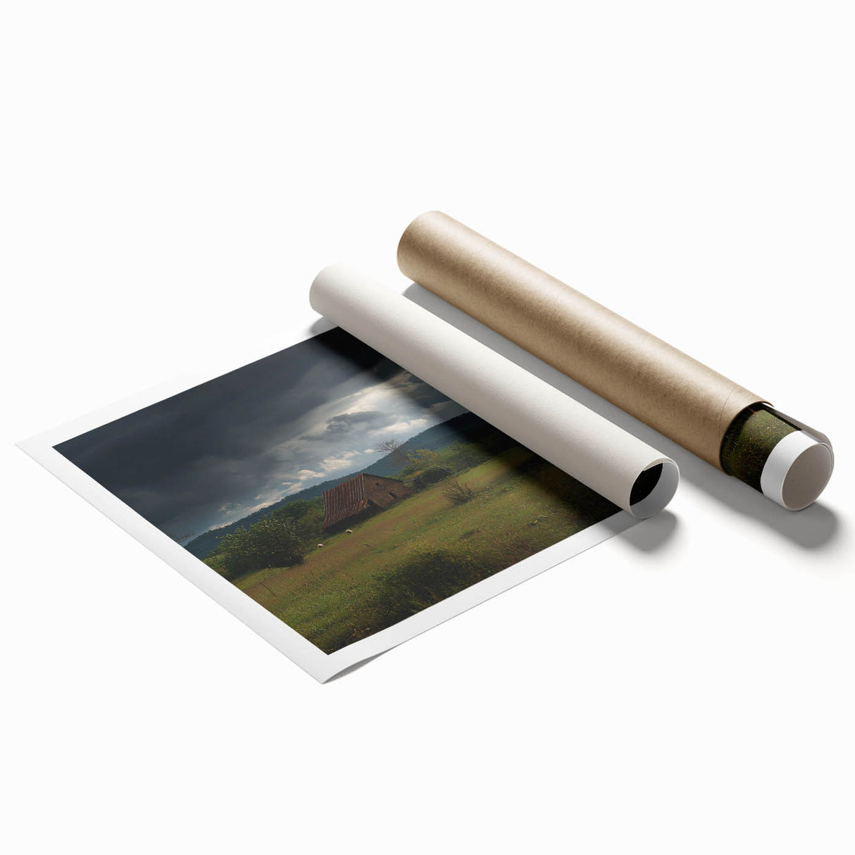 Rolled print showcasing a vibrant countryside landscape, featuring lush green fields and a serene blue sky, elegantly packaged for safe delivery.