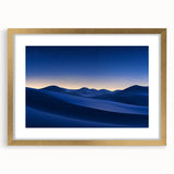 Framed desert landscape artwork with a gold mat, showcasing warm earth tones and dramatic lighting, perfect for enhancing home decor in modern interiors.