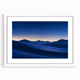 Desert landscape art print framed in a sleek white mat, showcasing warm tones and intricate details, perfect for home decor or gallery display.