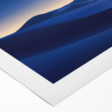 Vibrant rolled canvas depicting a stunning desert landscape with rich colors and intricate details, perfect for adding a touch of nature-inspired décor to any space.