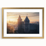 Elegant gold-framed landscape artwork depicting a serene castle scene, accentuated by a sophisticated mat, ideal for home decor and art enthusiasts.