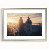 Elegant silver-framed landscape artwork depicting a majestic castle surrounded by lush greenery, designed for stylish home décor. Perfect for enhancing interior aesthetics.