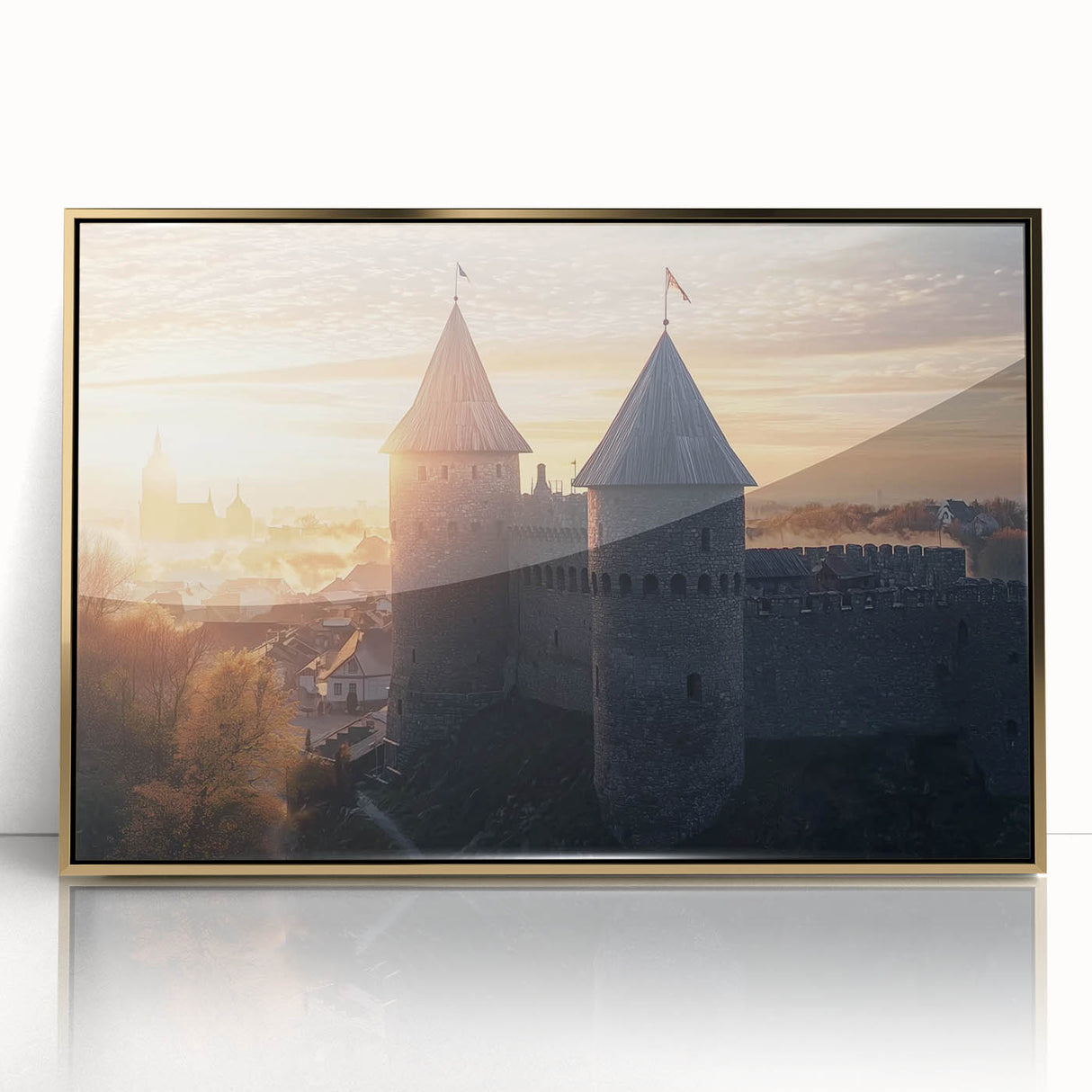 Framed acrylic artwork depicting a serene landscape with a majestic castle, elegantly bordered in gold, perfect for enhancing home decor with a touch of elegance.