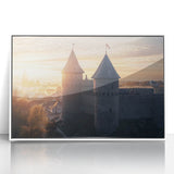 Framed acrylic artwork showcasing a vibrant landscape of a castle, set against a serene sky, with a sleek white frame enhancing its elegance. Perfect for home decor.