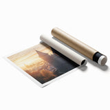 Rolled print showcasing a stunning landscape of a majestic castle set against a vibrant sunset, featuring rich colors and intricate details, perfect for home decor.