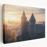 Stretched canvas artwork showcasing a picturesque landscape with a majestic castle set against a vibrant blue sky, ideal for home decor or art enthusiasts.