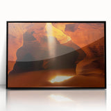 Framed acrylic artwork showcasing a stunning landscape with caves, featuring a sleek black frame. Ideal for modern home decor, adding depth and elegance to any space.