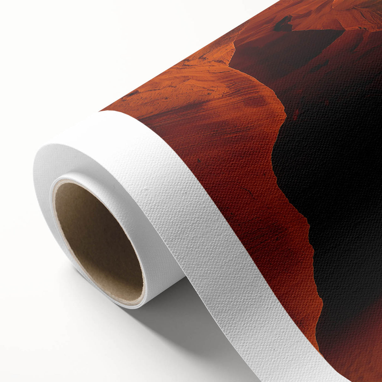 Rolled canvas showcasing a vibrant landscape design of intricate caves, perfect for home decor. The artwork is safely packaged in a sturdy cardboard tube for delivery.
