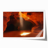 Rolled print showcasing a vibrant, abstract landscape design with intricate cave-like formations, featuring earthy tones of orange, brown, and green, ideal for home decor.