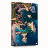 Acrylic landscape artwork showcasing dramatic cliffs in vibrant colors, displayed in a glass frame with pins for mounting, perfect for modern home decor.