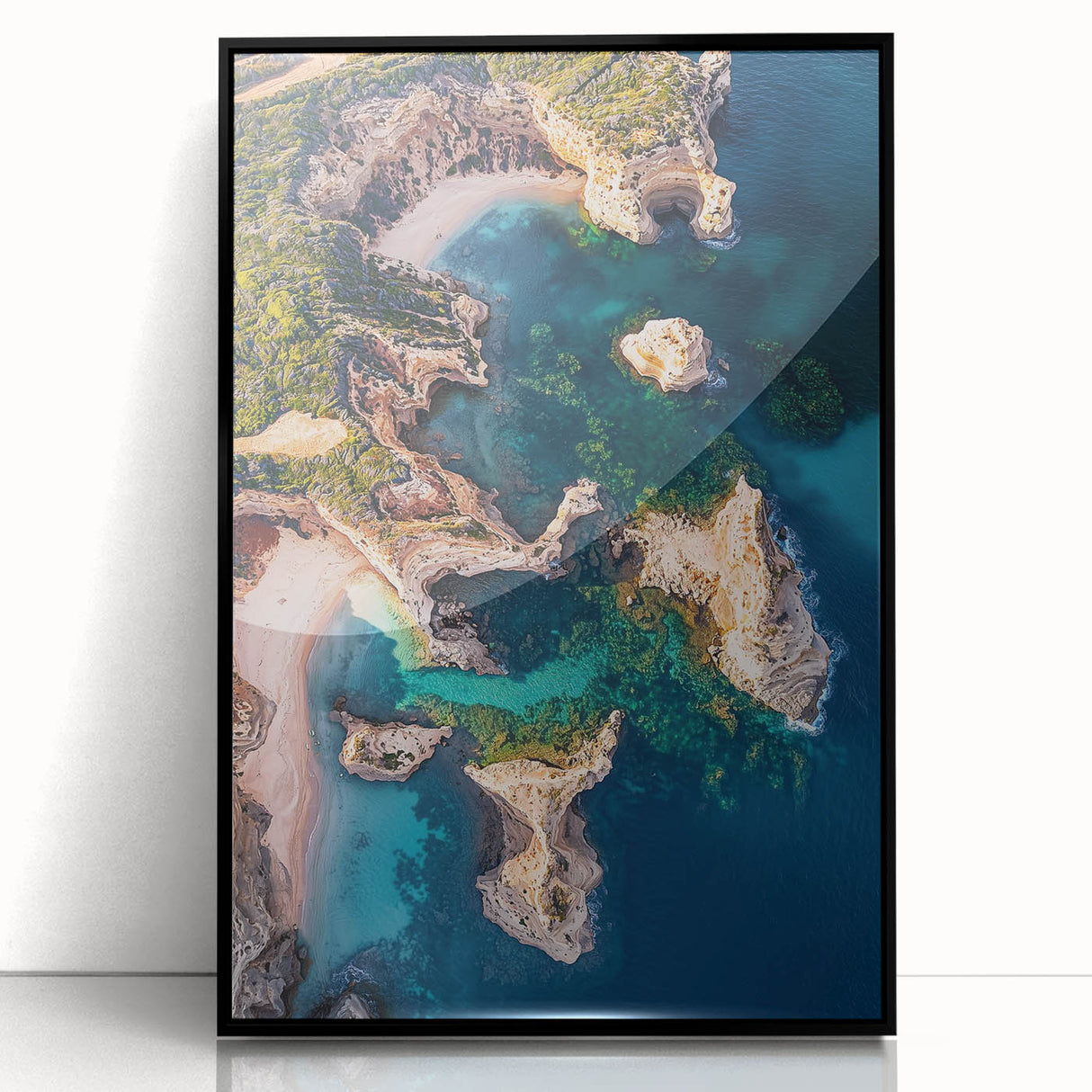 Framed acrylic artwork showcasing a stunning landscape of rugged cliffs against a vibrant sky, highlighted by black framing for a modern aesthetic. Ideal for home decor.