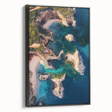Framed canvas artwork showcasing a dramatic cliff landscape in vibrant colors, displayed from a side view against a neutral background, perfect for home decor.