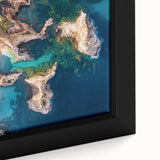 Framed canvas artwork depicting a dramatic cliff landscape with vibrant colors and intricate details, perfect for enhancing home decor aesthetics.