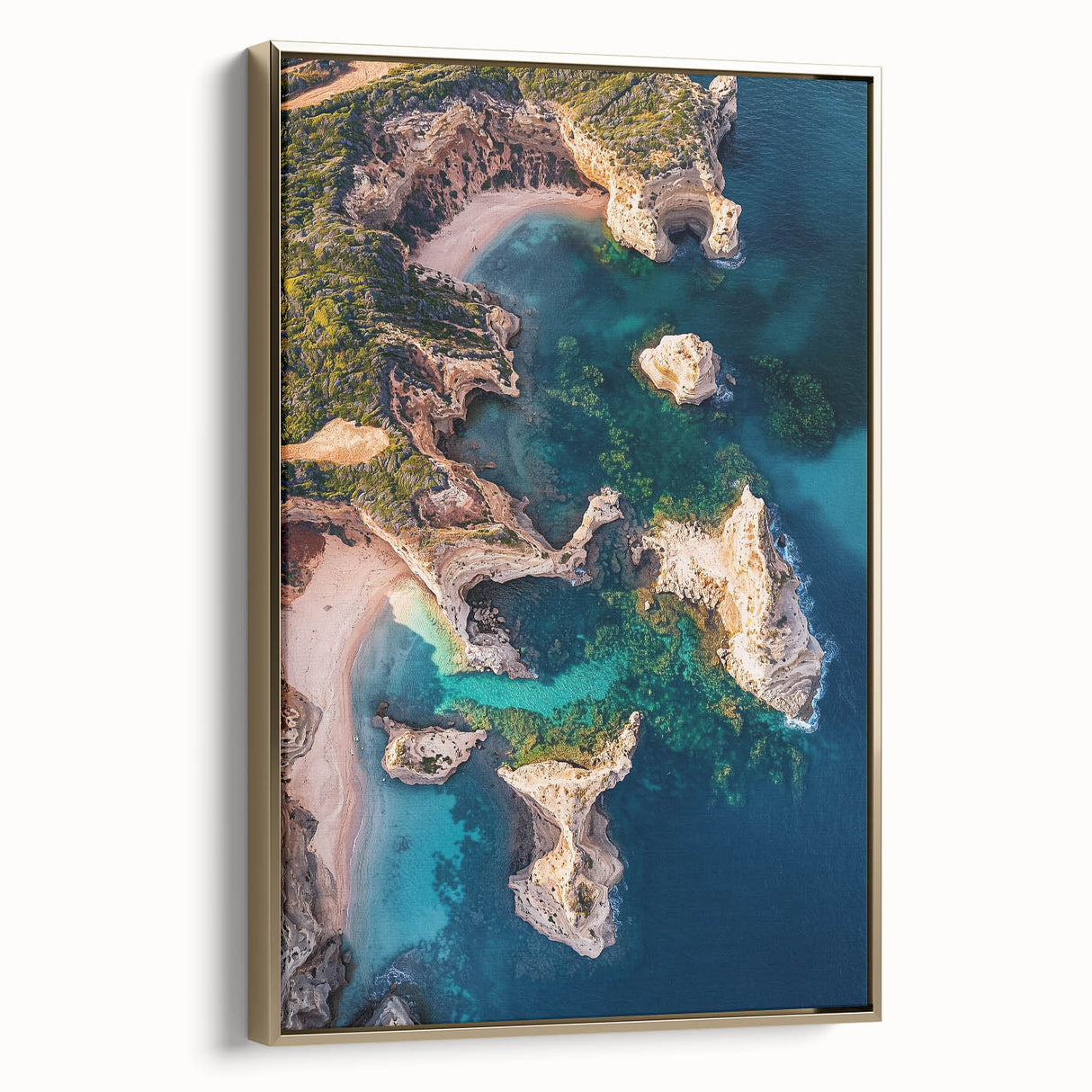 Framed canvas artwork depicting a stunning landscape of rocky cliffs bathed in golden hues, showcasing intricate details and textures, perfect for enhancing modern decor.