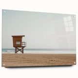 Acrylic glass landscape artwork showcasing serene beach scenery, displayed in a side view with decorative pins; ideal for coastal-themed interiors.