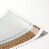 Stunning rolled print showcasing a vibrant beach landscape with golden sand and turquoise waves, elegantly packaged in a protective cardboard tube for easy display.