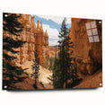 Acrylic landscape artwork depicting vibrant canyons in rich colors, showcased from a side view with elegant mounting pins. Ideal for modern decor and nature enthusiasts.