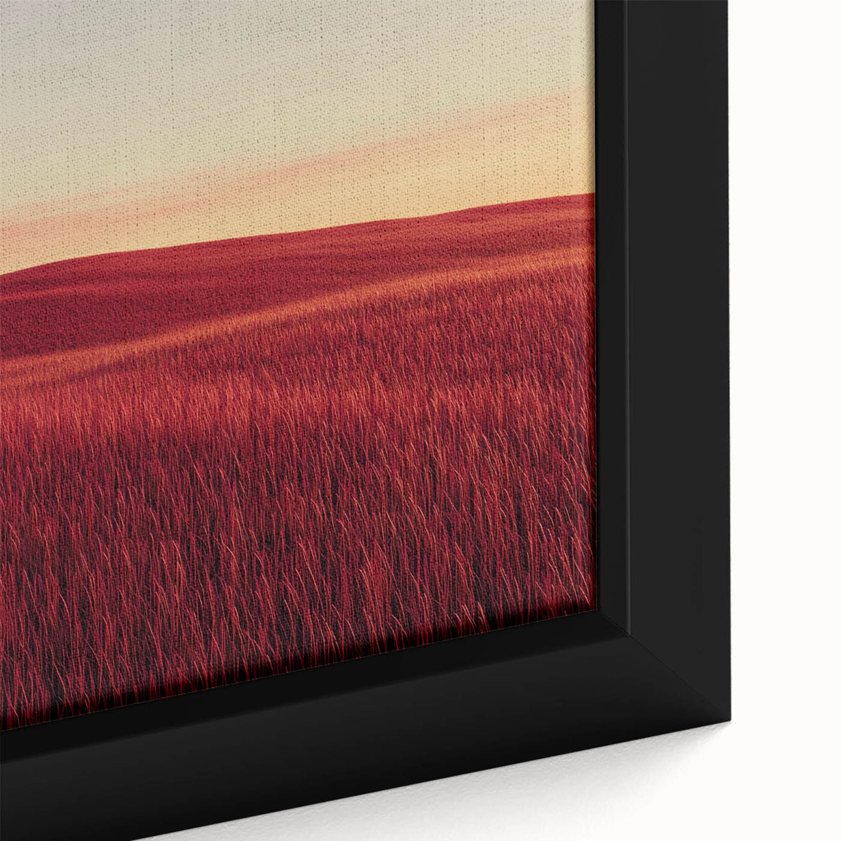 Close-up of a framed canvas depicting a serene countryside landscape, showcasing vibrant green fields and a clear blue sky, perfect for home decor.