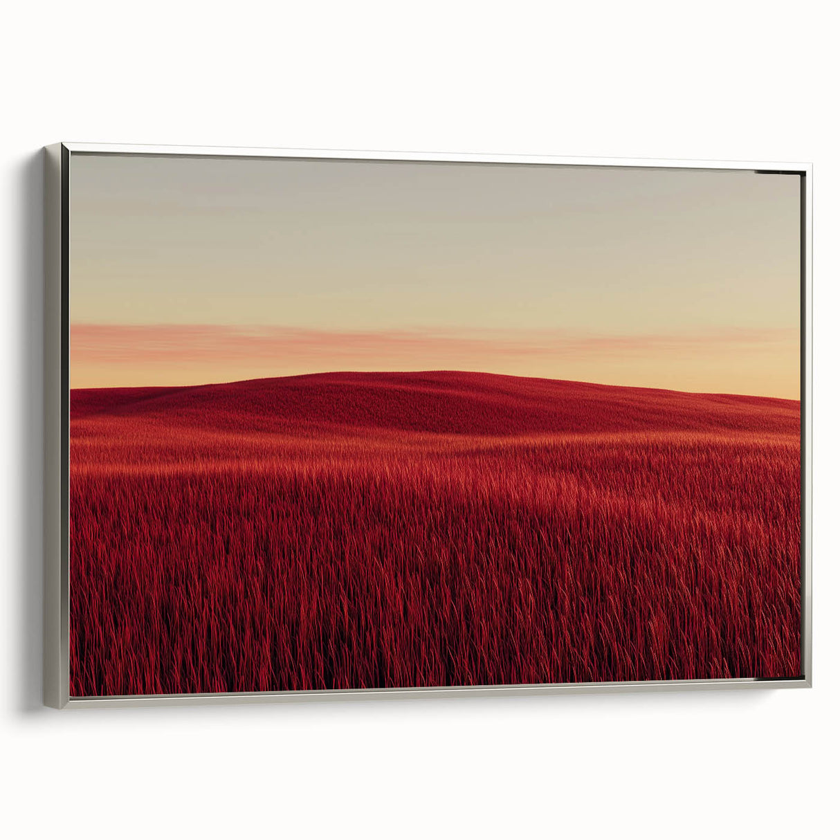 Framed canvas artwork depicting a serene countryside landscape with vibrant green fields and a clear blue sky, showcased in a sleek silver frame for an elegant touch.