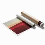 Rolling countryside landscape print on canvas showcasing vibrant green fields under a bright blue sky, beautifully packaged in a protective cardboard tube. Ideal for home decor enthusiasts seeking nature-inspired art.
