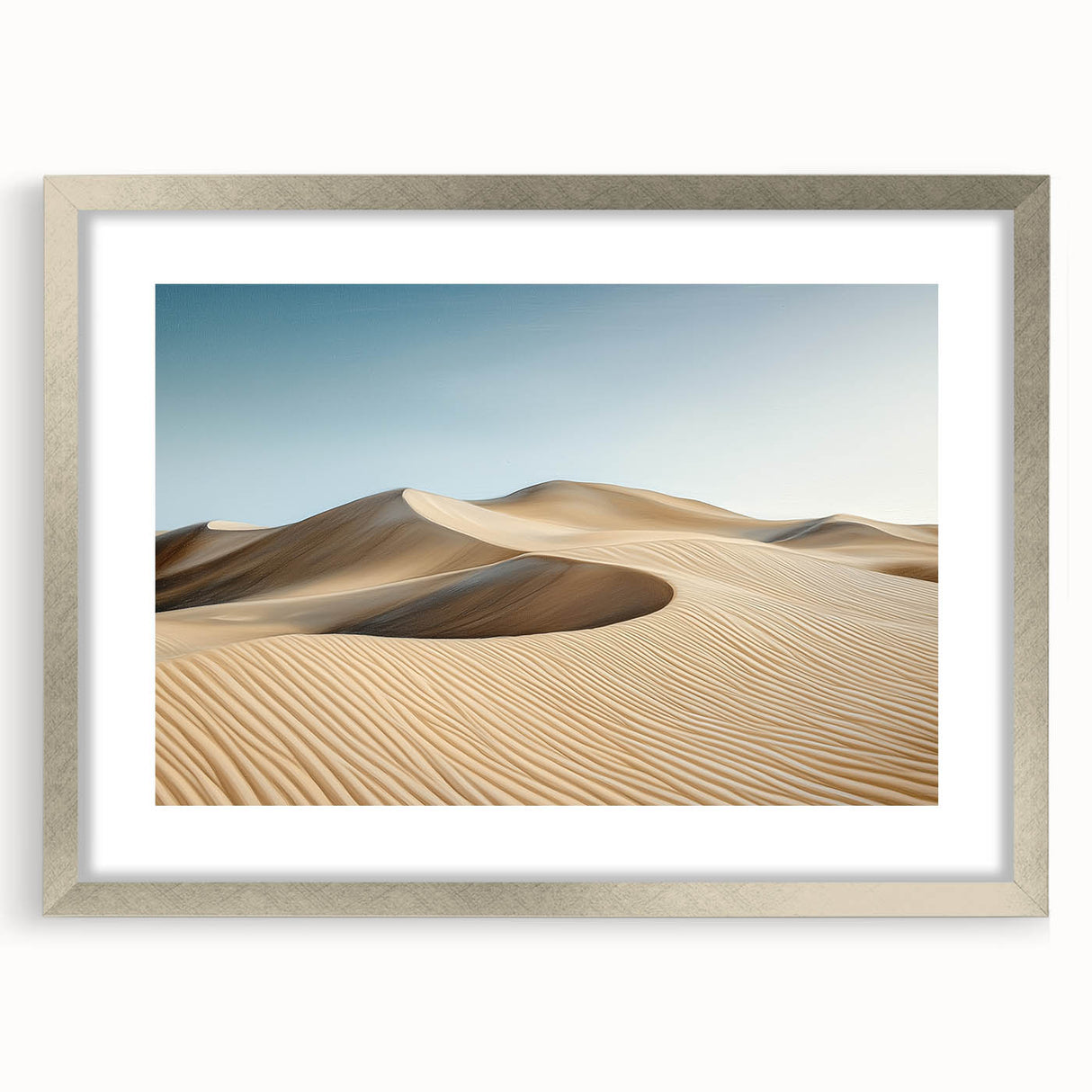 Elegant silver-framed landscape artwork depicting a serene desert scene, featuring soft hues of beige and warm gold, complete with a white mat and a sleek presentation. Ideal for enhancing modern home decor.