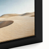Close-up of a framed desert landscape canvas art piece showcasing warm hues of orange and yellow, highlighting intricate details of the arid scenery, perfect for home decor.