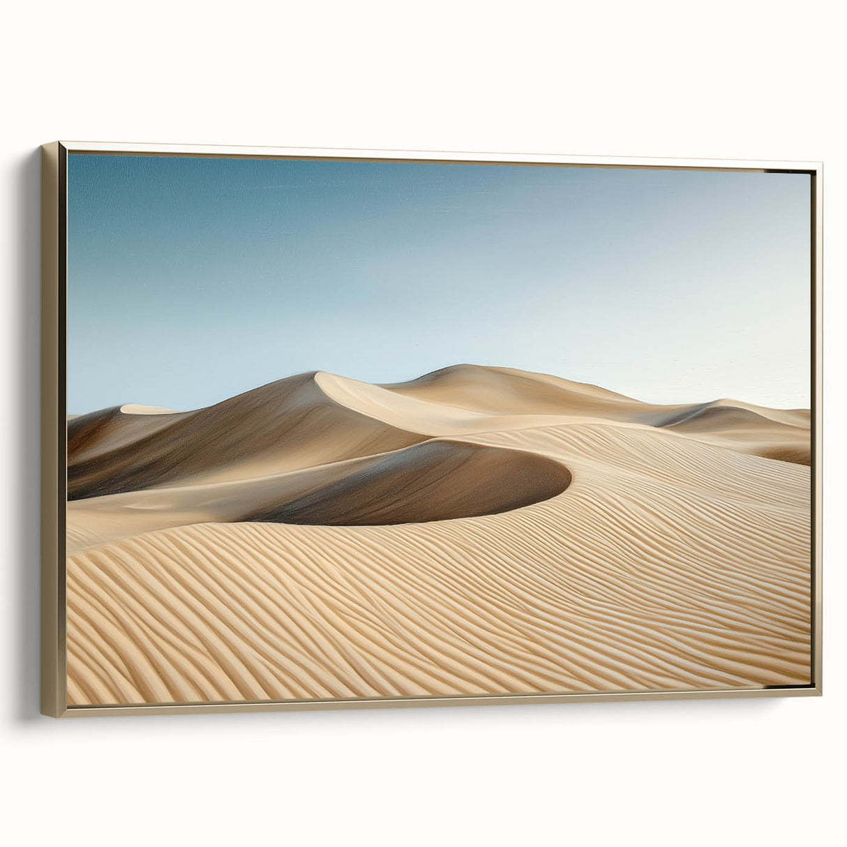 Framed canvas depicting a serene desert landscape with warm gold tones, showcasing rolling dunes and a clear blue sky, ideal for modern home decor.