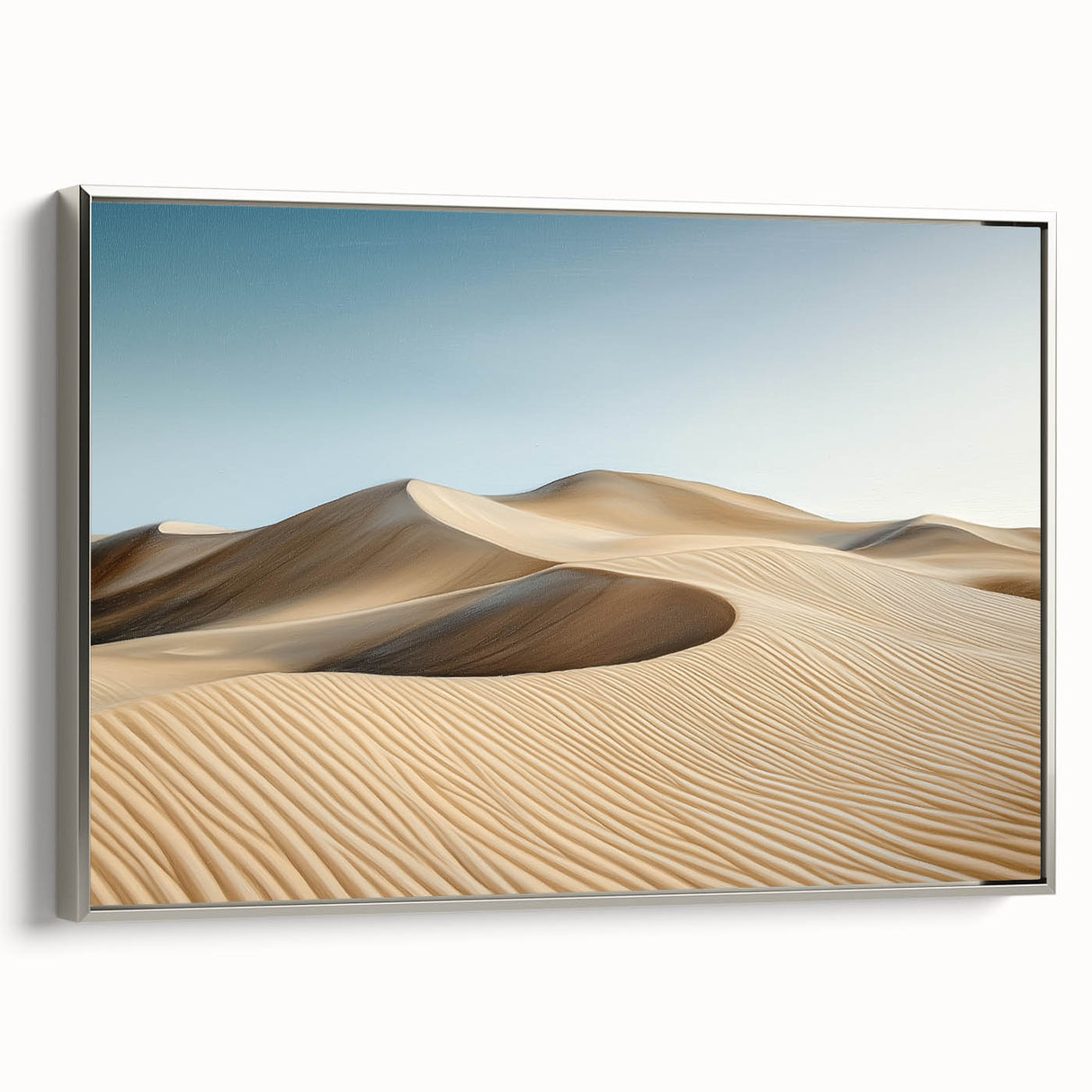 Framed landscape canvas depicting a serene desert scene with soft color tones, showcasing silver frame details and providing a modern decor touch. Ideal for enhancing home aesthetics.
