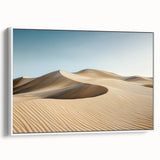 Framed canvas artwork showcasing a stunning desert landscape with warm tones of orange and beige, featuring a sleek white frame and side view display. Perfect for home decor enthusiasts.