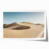 Desert landscape rolled print showcasing vibrant hues of orange and yellow, capturing the serene beauty of a sunset over dunes, ideal for home decor.
