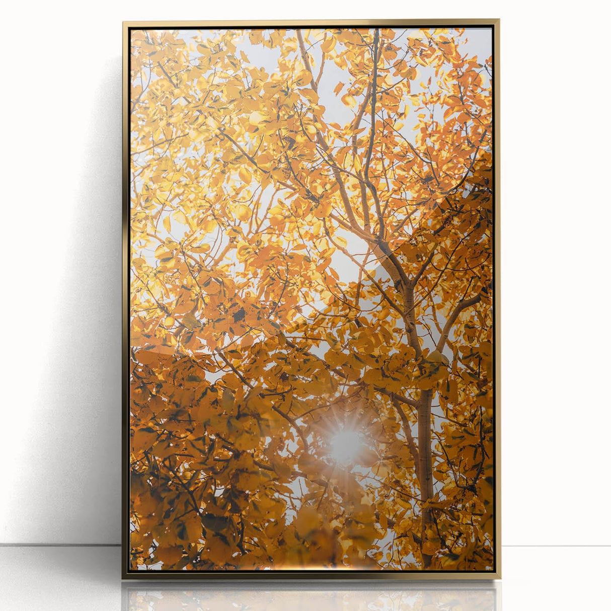 Large art print of a mid-century modernist autumn landscape in gold and orange tones, framed acrylic.