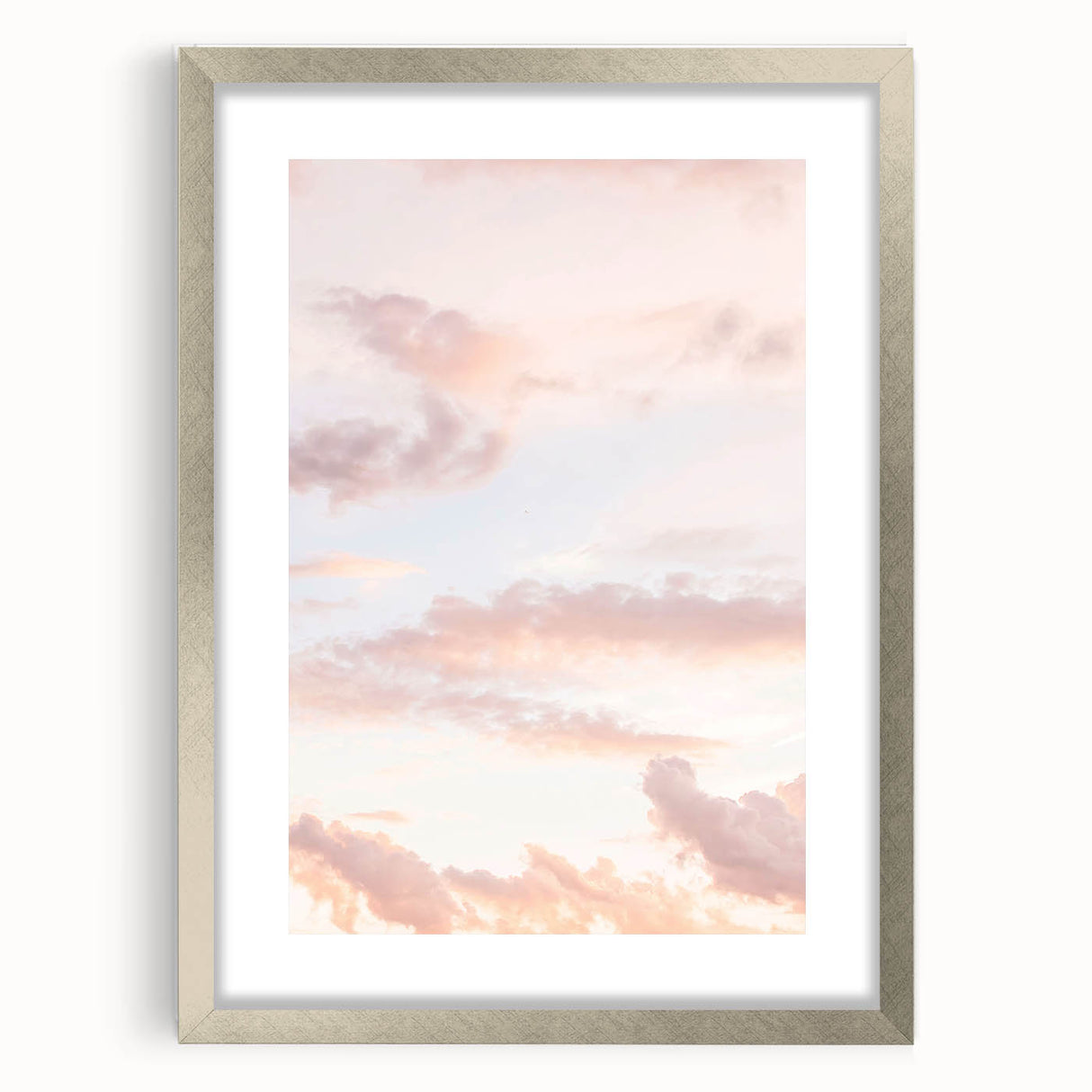 Textured abstract art print in vibrant orange and yellow tones on a silver-framed canvas, ideal for bedroom wall decor.