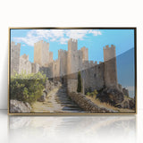 Framed acrylic artwork depicting a scenic landscape with a majestic castle, featuring a gold frame that enhances the vibrant colors and intricate details. Ideal for home decor, this piece adds elegance to any living space or office.