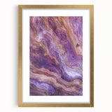 Framed landscape artwork showcasing dramatic cliffs in vibrant colors, accented with a gold mat for an elegant finish, ideal for home decor.