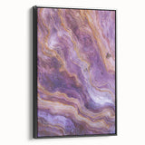 Framed canvas artwork depicting a stunning cliff landscape, showcasing vibrant colors and intricate details, presented in a sleek black frame for a modern aesthetic.