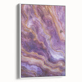 Framed canvas artwork depicting a dramatic cliff landscape in shades of blue and gray, showcasing textured details and a white frame, ideal for modern home decor.