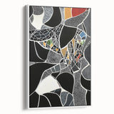 Abstract geometric framed canvas artwork featuring bold white and gray patterns, designed to enhance modern interiors. Perfect for contemporary home decor.