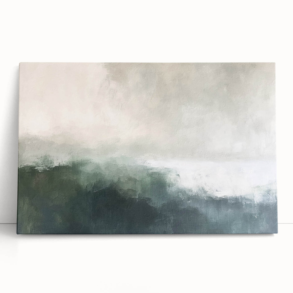 Abstract landscape wall art featuring soft pastel colors and fluid shapes, printed on stretched canvas, leaning against a textured wall for a modern aesthetic.