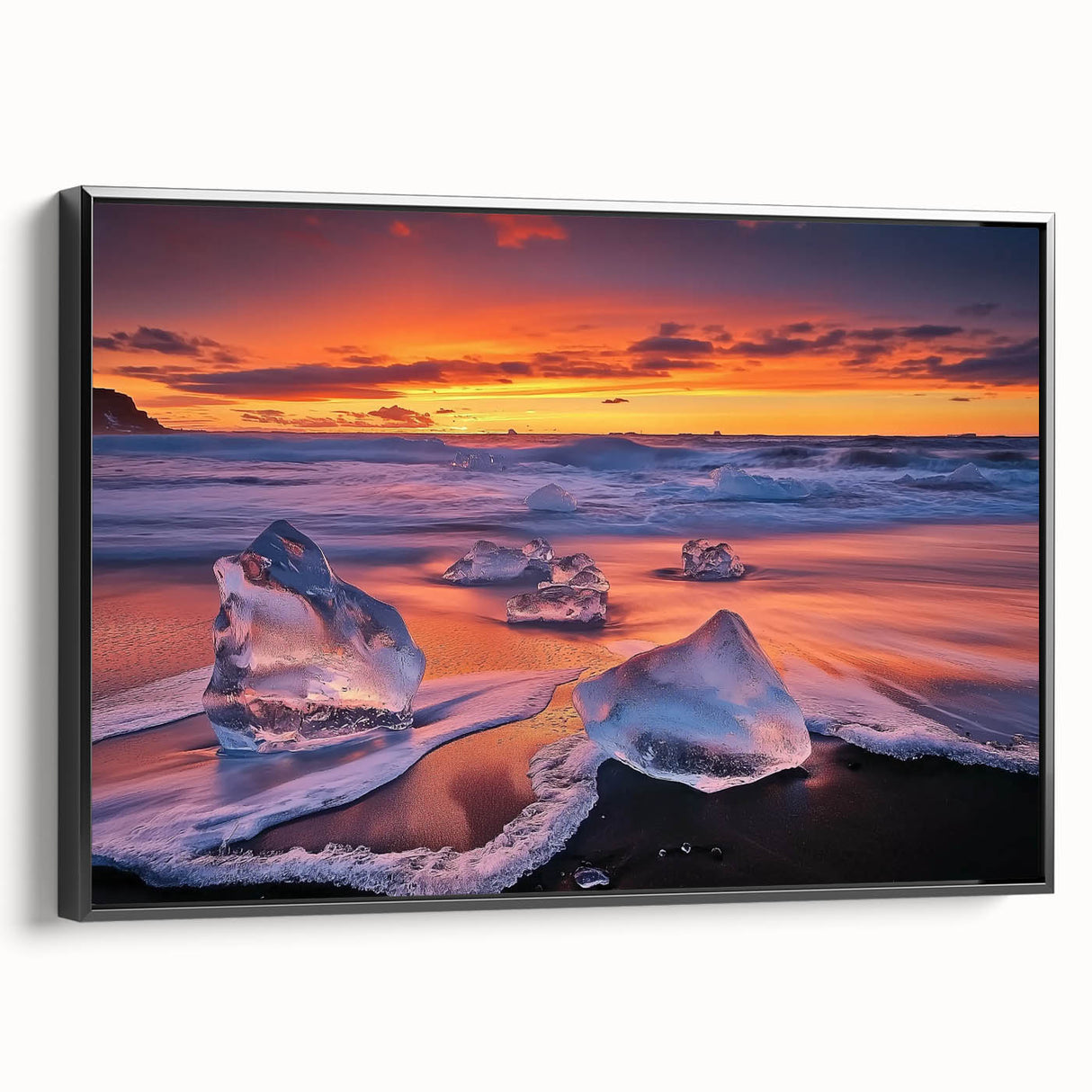 Framed canvas artwork depicting a serene beach landscape at sunset, featuring vibrant blues and warm golds, with a sleek black frame enhancing its elegance. Ideal for adding a tranquil touch to home decor.