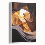Framed landscape canvas showcasing a stunning view of canyons in vibrant colors, set against a sleek white frame, perfect for modern home decor.