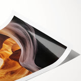 Landscape print showcasing vibrant canyons with rich earthy tones, rolled and securely packaged in a durable tube, perfect for wall decor enthusiasts.