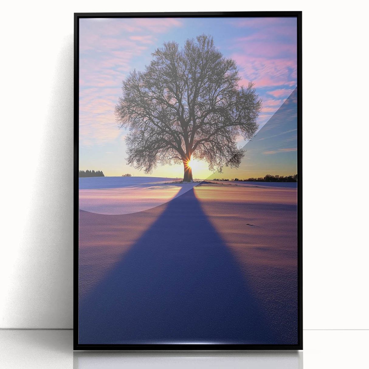 Framed acrylic artwork showcasing a serene countryside landscape, featuring vibrant greens and soft blues, elegantly presented in a sleek black frame.