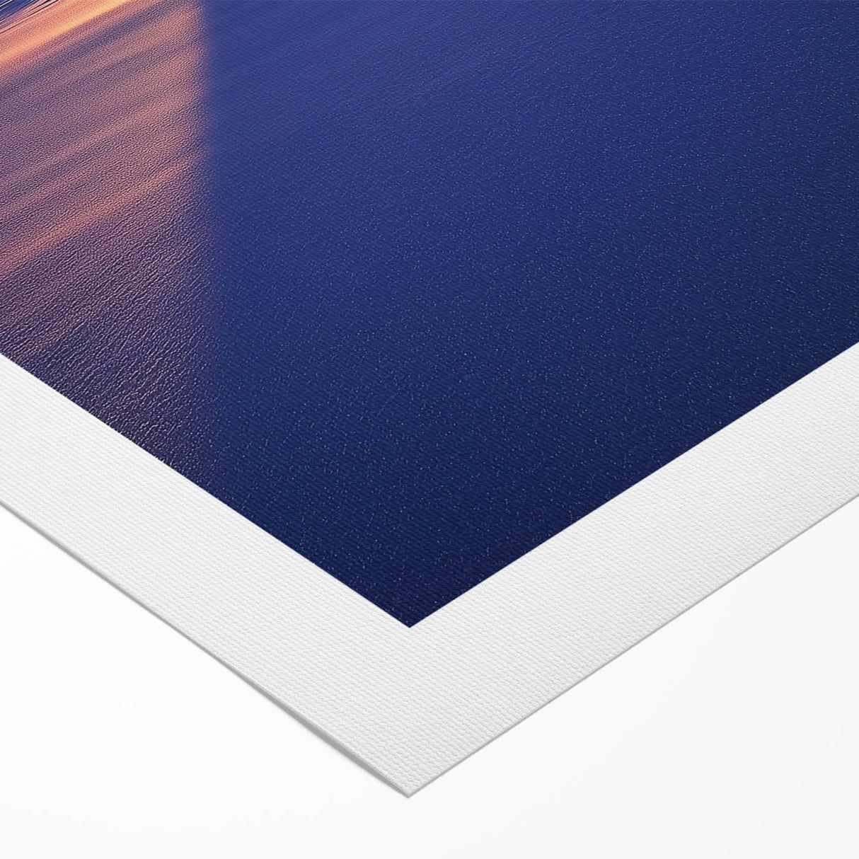 Rolled canvas artwork showcasing a vibrant countryside landscape, featuring lush green fields and a serene blue sky, elegantly packaged in a protective tube for safe shipping.