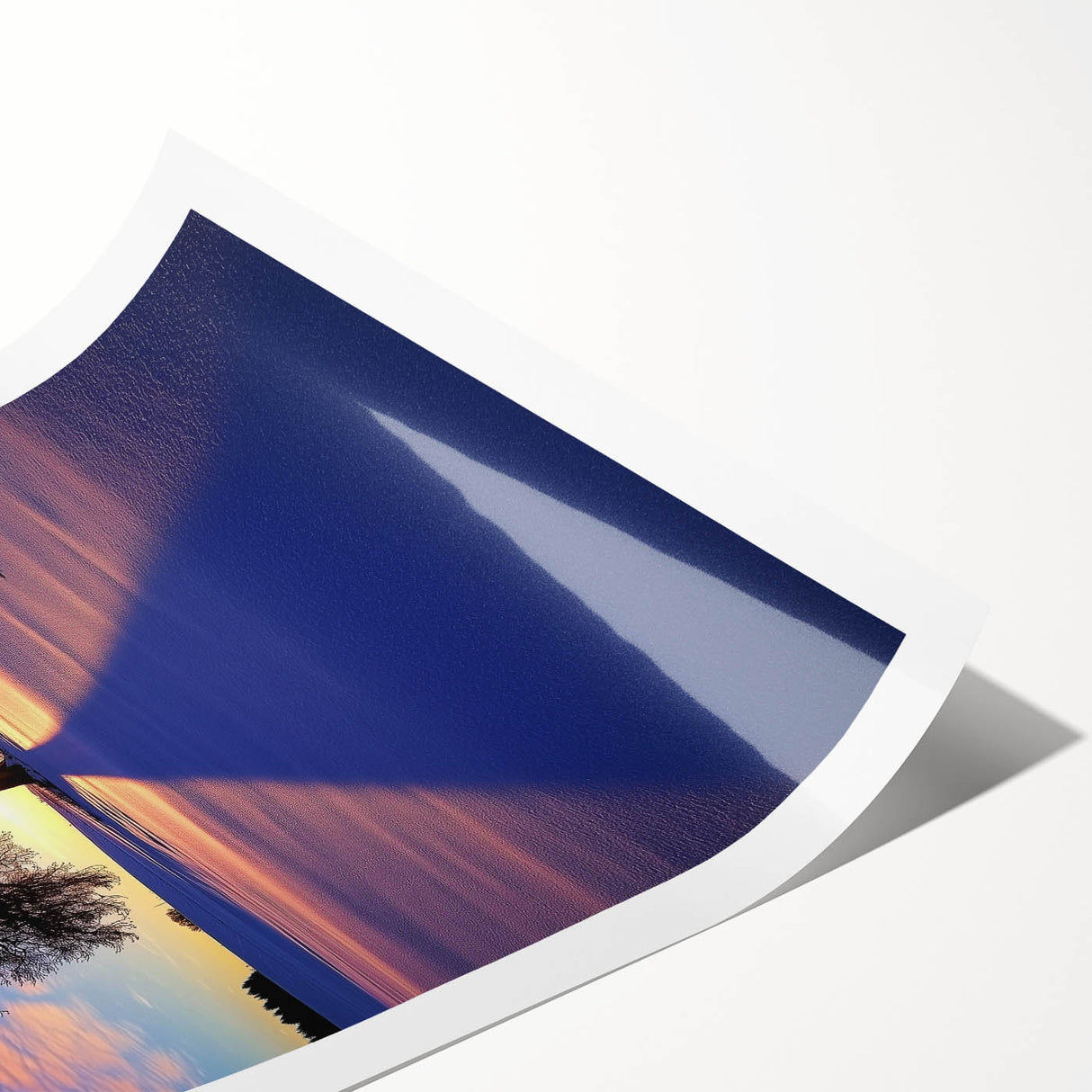 Scenic countryside landscape rolled print showcasing vibrant green fields, distant hills, and a clear blue sky, elegantly packaged in a protective cardboard tube.