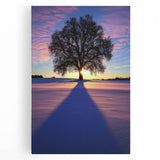 Vibrant stretched canvas artwork depicting a serene countryside landscape with lush green fields, mountains in the background, and a bright blue sky, perfect for home decor.