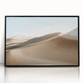 Framed acrylic artwork showcasing a vibrant desert landscape, featuring warm hues of orange and yellow, with a sleek black frame that adds elegance, perfect for modern decor.