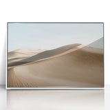 Framed acrylic artwork depicting a vibrant desert landscape with warm hues of orange and yellow, set in a sleek white frame, ideal for modern home decor.