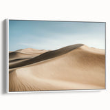 Framed canvas art showcasing a vibrant desert landscape with warm hues of orange and yellow, displayed from a white side view perspective, ideal for home decor.